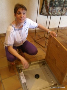 Marie Chartier-Luneau showing the underground vats